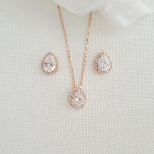 Elegant rose gold teardrop cubic zirconia necklace and stud earrings set.