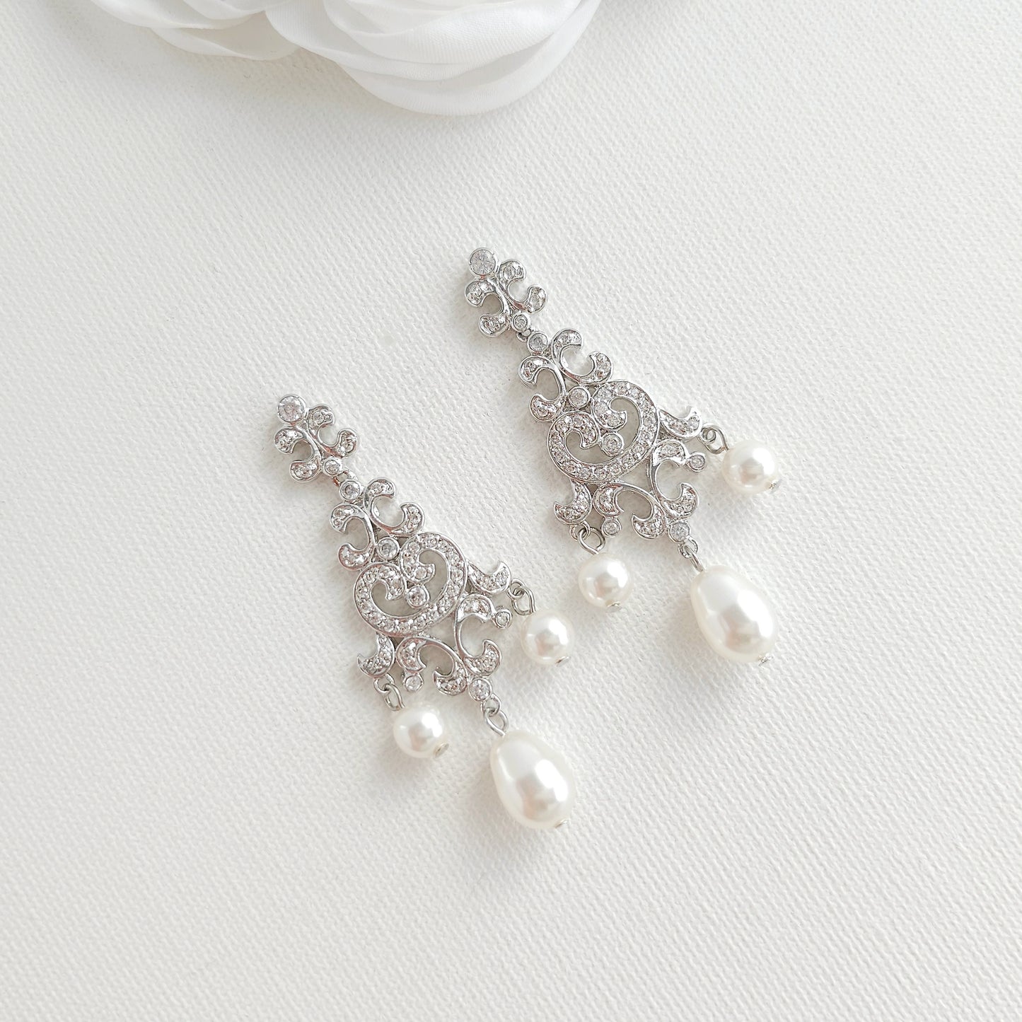vintage style pearl drop chandelier earrings featuring cubic zirconia and flawless round crystal pearls.