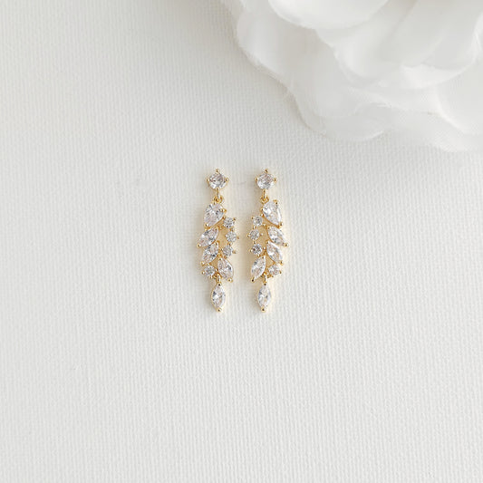A pair of gold drop earrings with clear marquise and round-cut CZ 