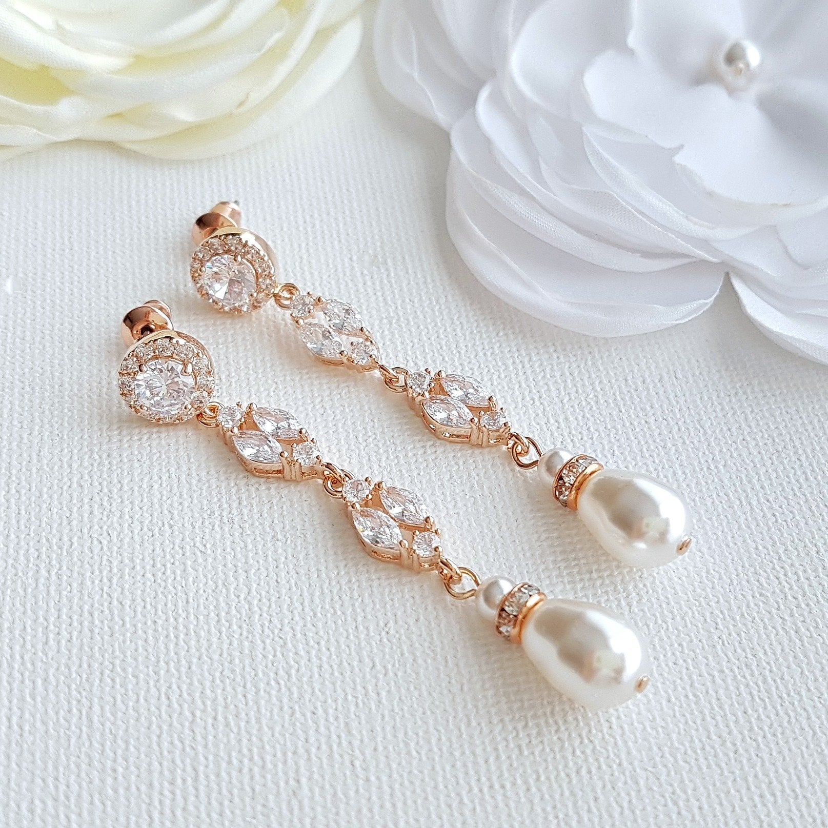 elegant pearl drop earrings in rose gold for brides- Poetry Designs