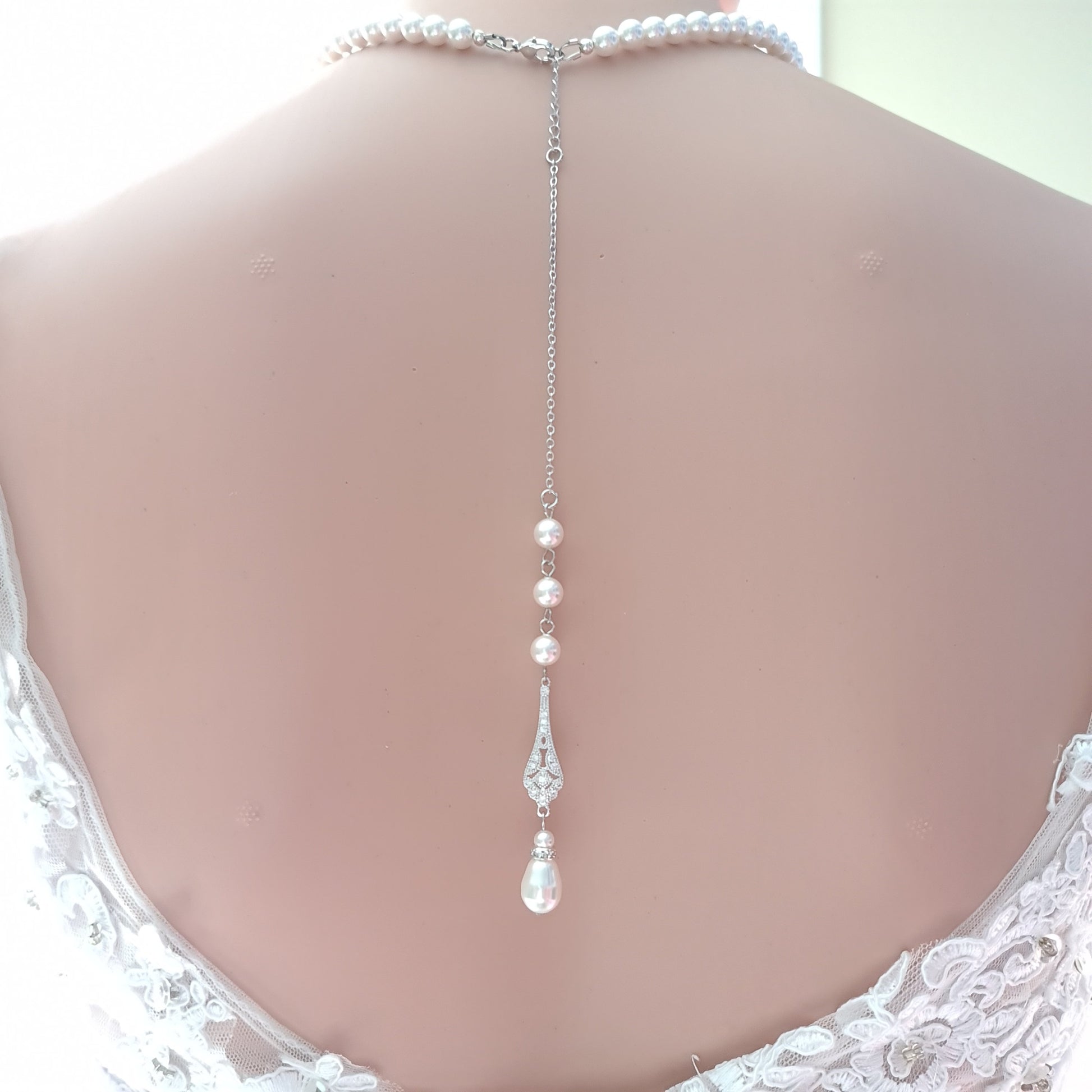 jewelry for off the shoulder wedding dress What Jewelry to Wear with Your Wedding Dress Oscar Stone NYC