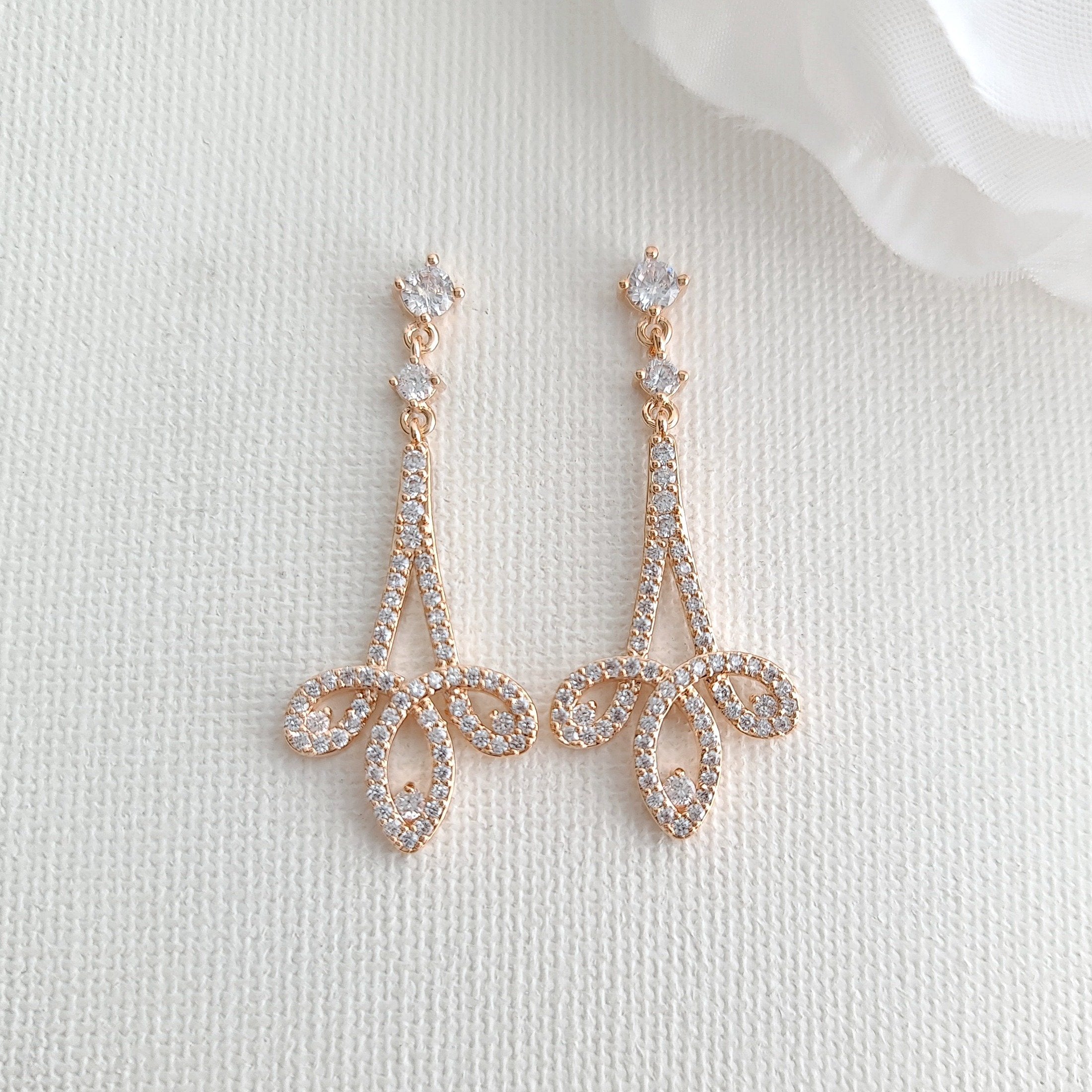 AD Earrings with Clear Stone Danglers in Rose Gold Polish – Sheetal's  FabFashion